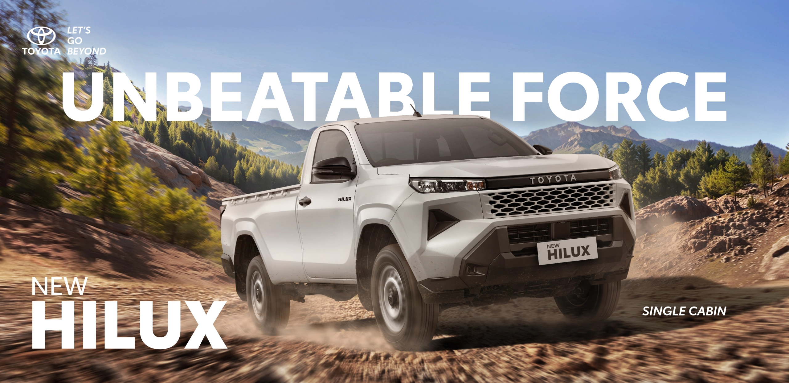 Banner promosi Toyota New Hilux Single Cabin warna putih yang melaju tangguh menerjang jalanan tanah berdebu di area pegunungan, memuat tagline utama Unbeatable Force.