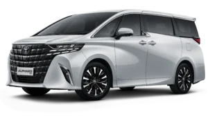 Mobil Toyota All New Alphard Tipe HEV (Hybrid) varian warna putih mutiara, tampak serong depan memamerkan keanggunan MPV kelas VVIP dengan grille eksklusif berlatar belakang hitam pekat.